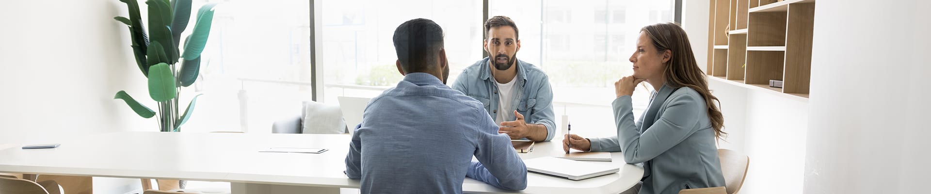 Image of business owner meeting with new clients