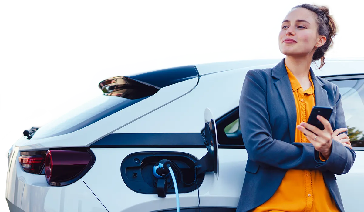 Image of women charging electric vehicl