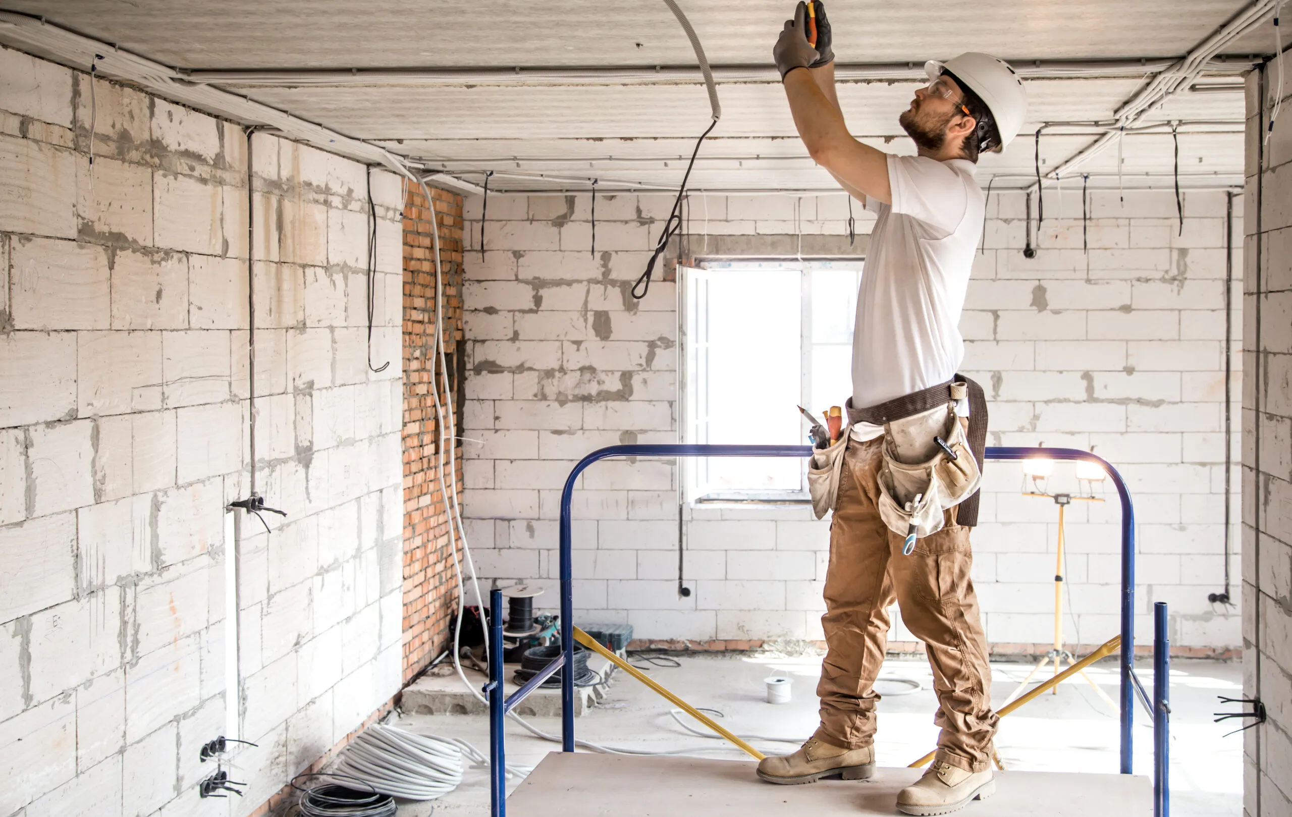 Builder working on electrical wiring for building Clarksville TN