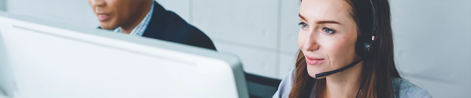 Image of customer service representative answering a phone call