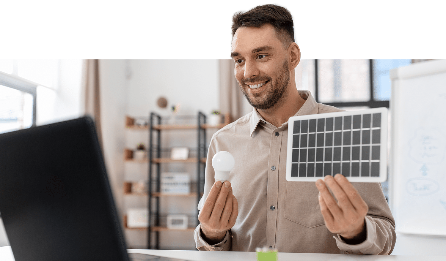 Image of energy solutions specialist explaining solar panel and energy, efficient lightbulbs